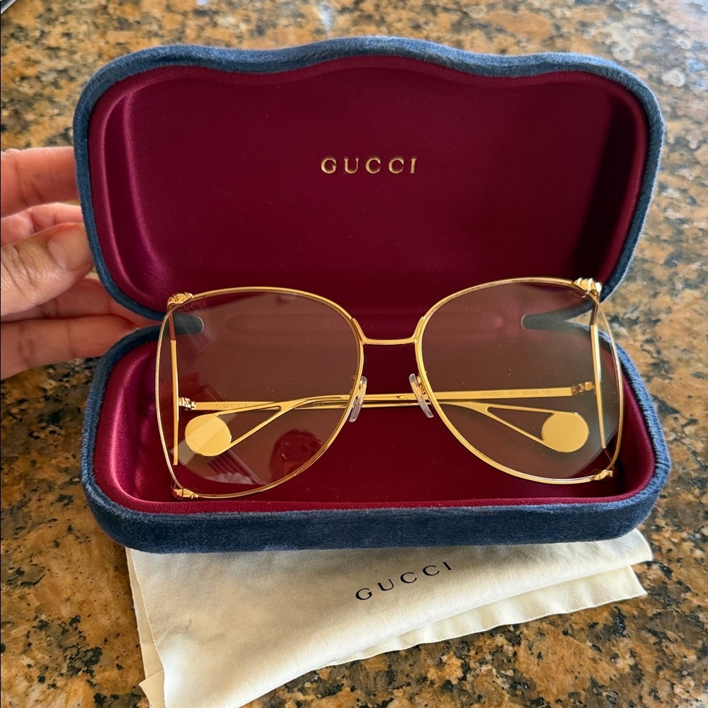Gucci Women's Gold Frame Glasses
